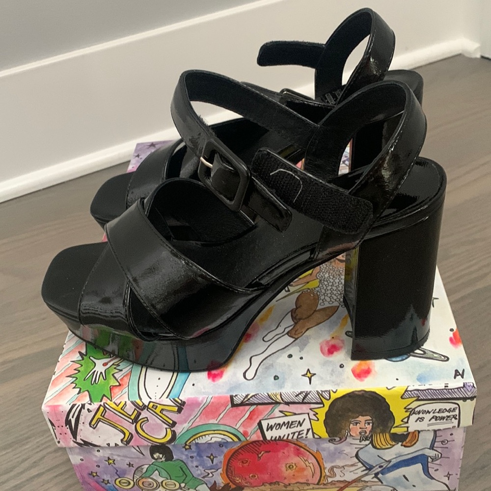 Jeffrey Campbell platform black crinkle patent dress shoes.